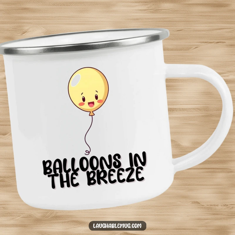 Funny camping mug showing a playful balloon juggling its string, perfect for outdoor beverages.