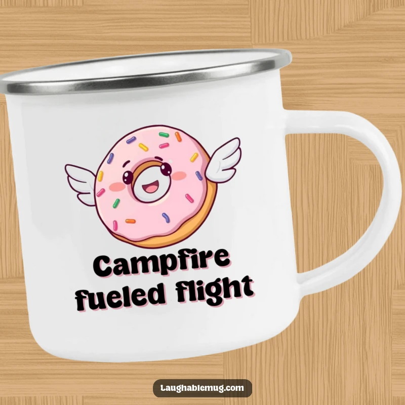 Funny camping mug showing a joyful donut with small wings, ready for flight, perfect for outdoor adventures.