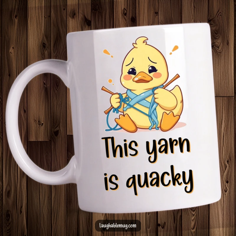 Funny mug featuring a confused rubber duck tangled in yarn, hilariously attempting to knit with wide, bewildered eyes.