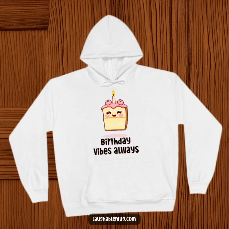 Funny Hoodie: Giggling slice of cake balancing a single candle on its nose, a warm and humorous piece.