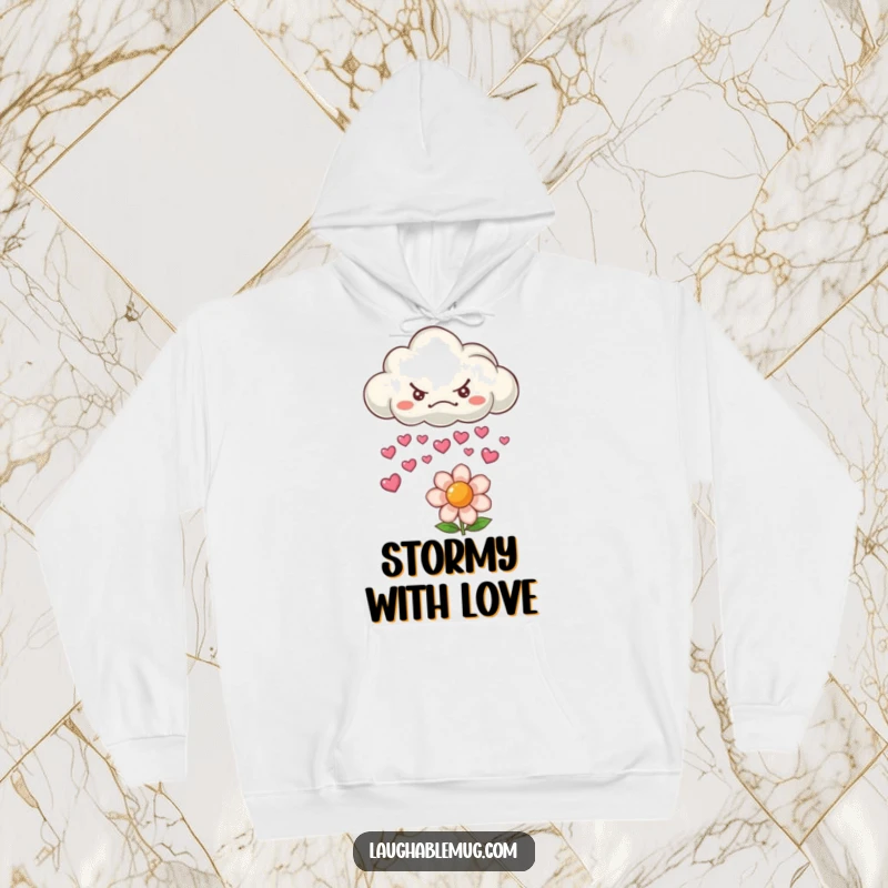 Funny hoodie depicting a grumpy cloud raining hearts on a flower, perfect for cozy comfort.