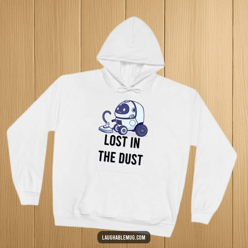 Funny hoodie depicting a clumsy robot vacuum cleaner comically chasing its own tail, perfect for cozy wear.