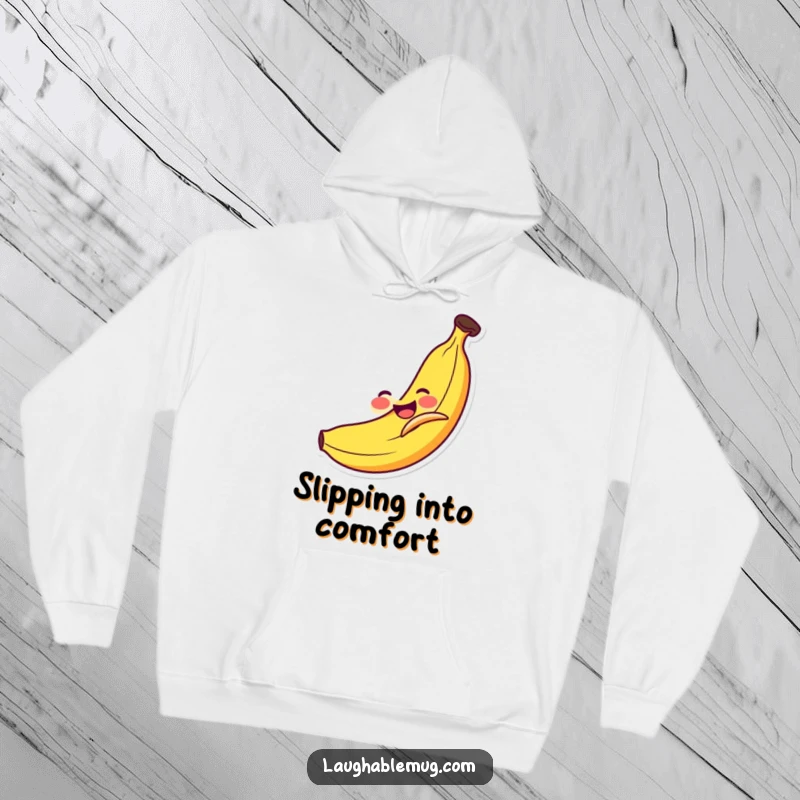 Funny Hoodie: Smiling banana comically slipping on its own peel, a warm and humorous piece for casual wear.