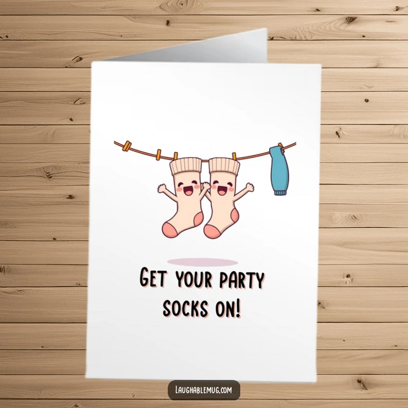 Funny free printable birthday card showing two excited socks dancing joyfully on a clothesline, a fun downloadable greeting.