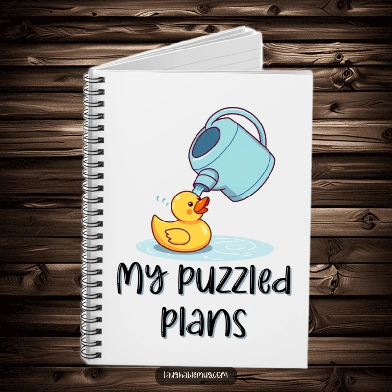 Funny notebook featuring a confused watering can watering a rubber duck, ideal for jotting down notes, ideas, or gardening plans with a humorous touch.