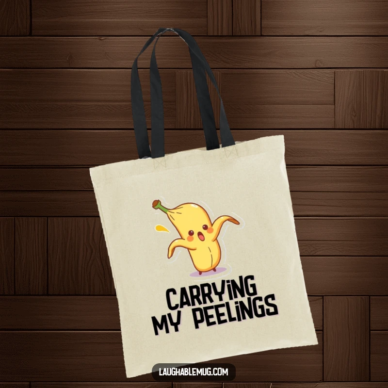 Funny tote bag featuring a surprised banana peel character comically slipping on itself, perfect for carrying items with a touch of humor.