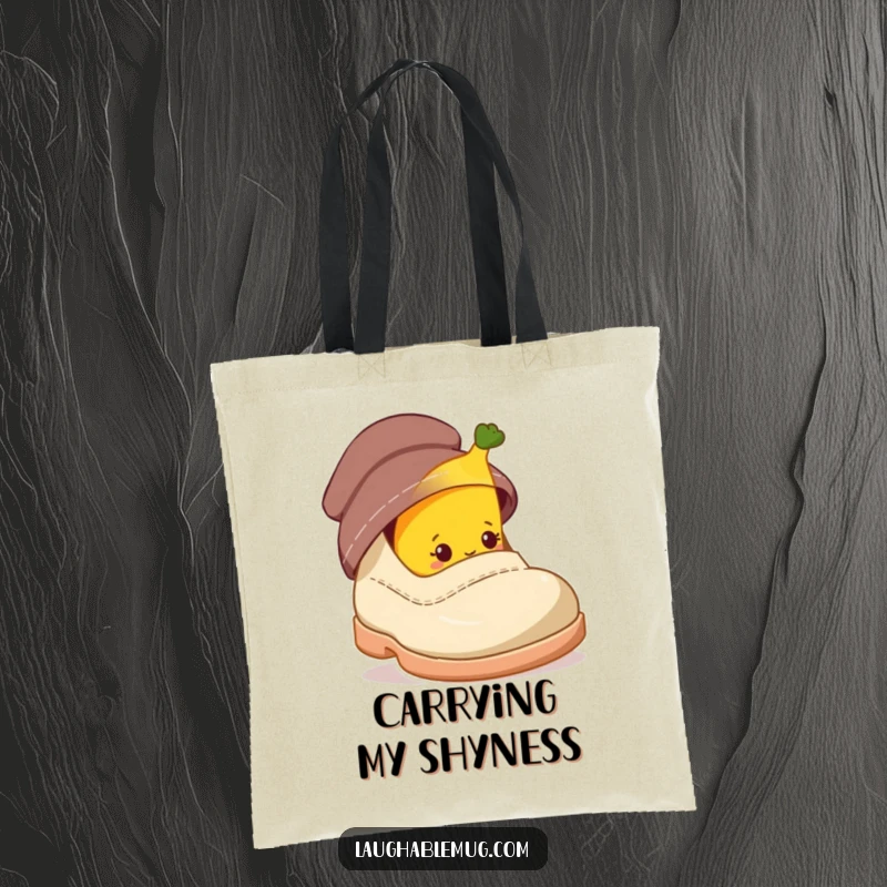 Funny tote bag with a shy banana character peeking from behind a giant shoe, perfect for quirky errands.