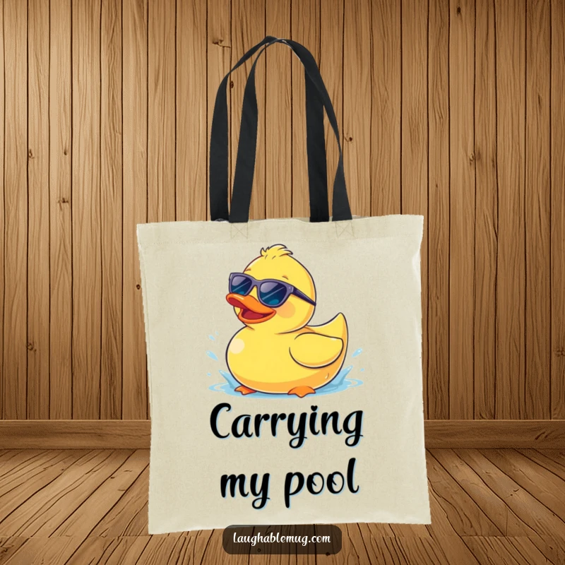 Funny tote bag showcasing a happy rubber ducky wearing sunglasses, splashing playfully, perfect for beach or pool days.