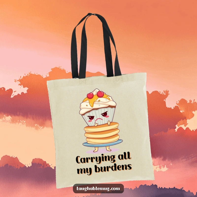 Funny tote bag showing a grumpy cupcake balancing a tall, wobbly stack of pancakes, ready to carry essentials.
